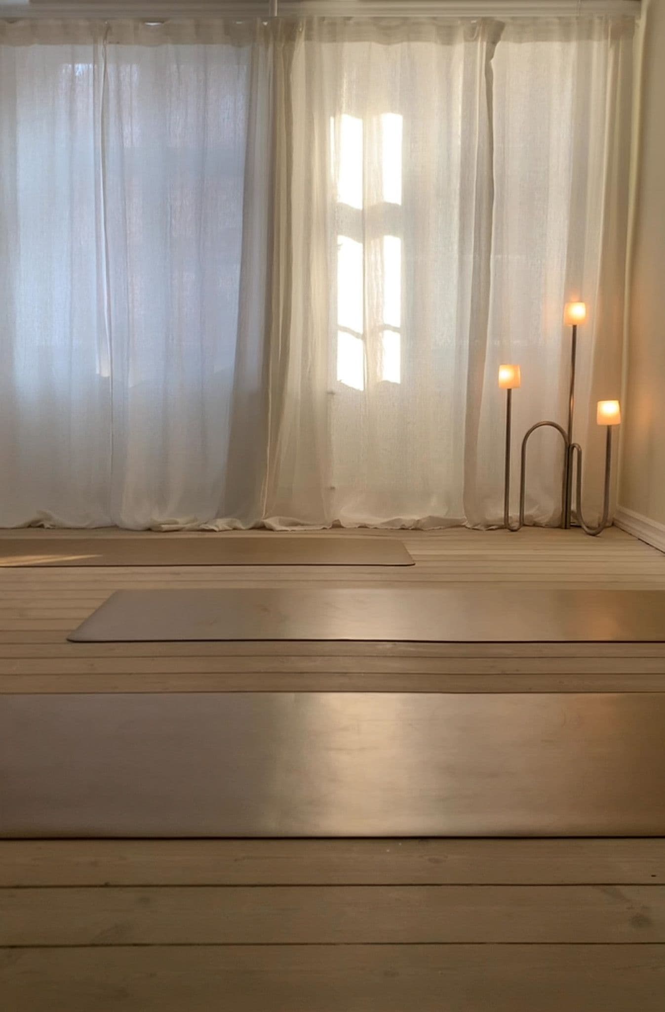Team Pilates practice arranged in a bright office space